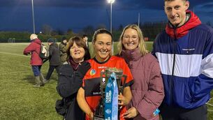 <p>Katie Garry Murphy with the Ashbourne Cup and Margaret Garry Murphy, Molly Garry Murphy and David Blanchfield</p>