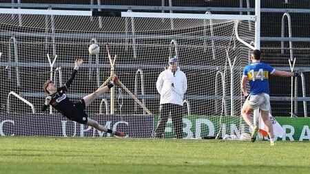 Footballers riding on a crest of a wave