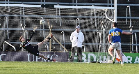 Footballers riding on a crest of a wave