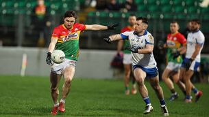 <p>Conor Crowley scores a fine point for Carlow during the win over Waterford </p>