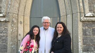 <p>Rev Paul with his wife Betty and daughter Maebh </p>