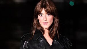 Romeo Beckham and Rosie Huntington-Whiteley on catwalk at London Fashion Week