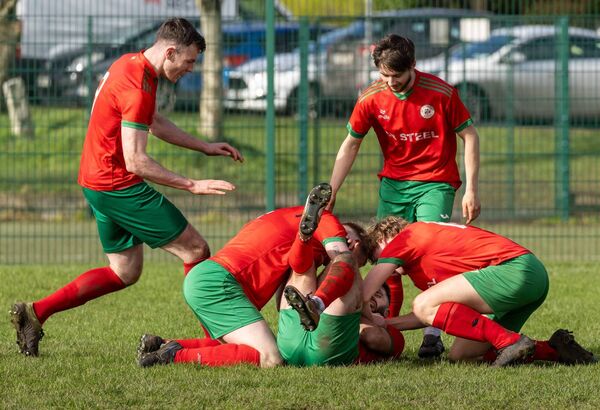 St. Patrick’s Joe Sunderland is congratulated by Sean Buggy, Jan Flejszar, Callum Warfield and Brandon Kelly after scoring his second, and his team's third goal, against Hanover Harps Photo: © Michael O'Rourke Photography 2026