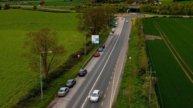 <p>Cars parked near roundabout on R448 near Prumplestown Cross off junction 4. Photo: michaelorourkephotography.ie</p>