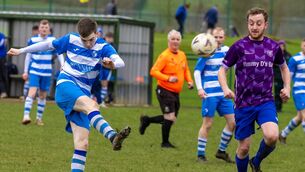 <p>Scott Roycroft (St. Fiacc's) fires in a shot at the Bagenalstown goal.</p>