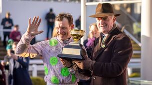 <p>Paul Townend and Willie Mullins celebrate with the Boodles Cheltenham Gold Cup. Photo: INPHO/Morgan Treacy</p>