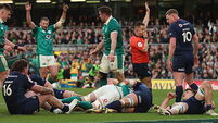 Ireland keep pressure on France with bonus-point win over Scotland