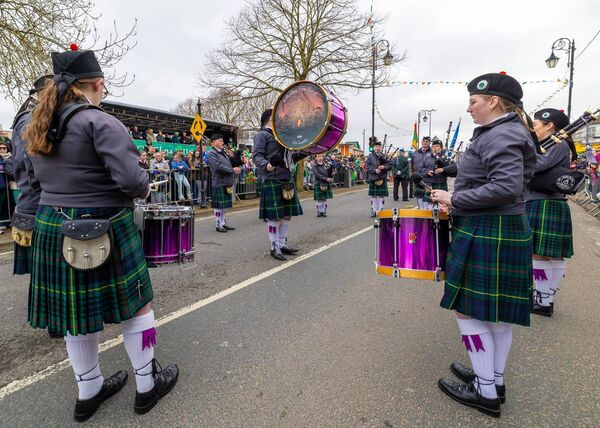 Members of Killeshin Pipe Band preform 