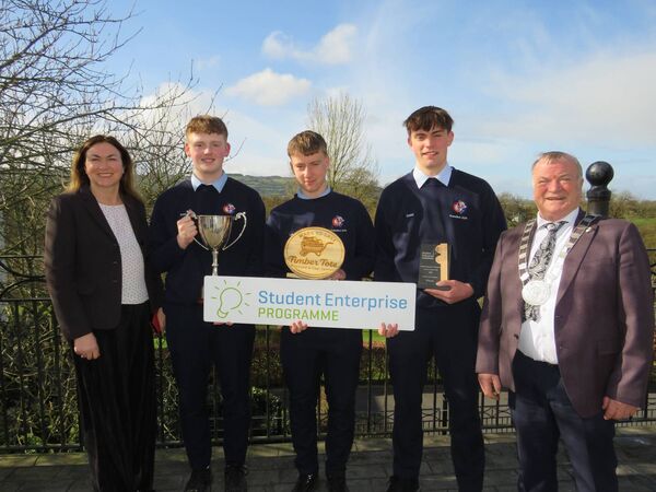Senior winners of the Carlow Student Enterprise Programme county finals were Peter Kavanagh, Daniel Collins and Luke McGrath of Coláiste Eoin, Hacketstown, pictured here with Dearbhla O'Dwyer of the Local Enterprise Office and cathaoirleach Ken Murnane
