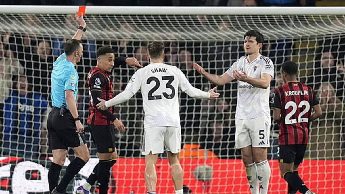 Harry Maguire’s England recall tempered by red card in Man Utd draw