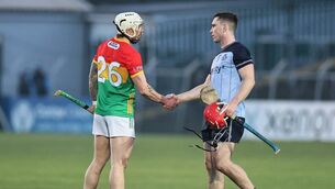 <p>Carlow's James Doyle, who made a welcome return to action after injury, shakes hands with Dublin's Paddy Smyth after the final whistle Photo: Pat Ahern</p>