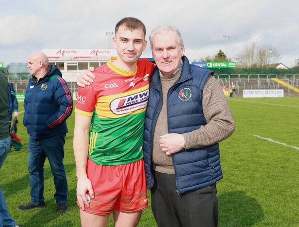 Ollie Hennessey congratulates Lee Moore 