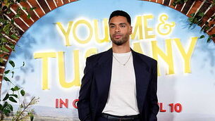 Liam and Noel Gallagher shown having a laugh in Oasis tour photography book