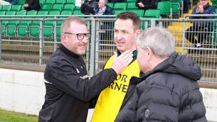 <p>Carlow manager Joe Murphy shows his delight at the final whistle with Chris Bolger and Jim McDonnell Photos: Pat Ahern</p>