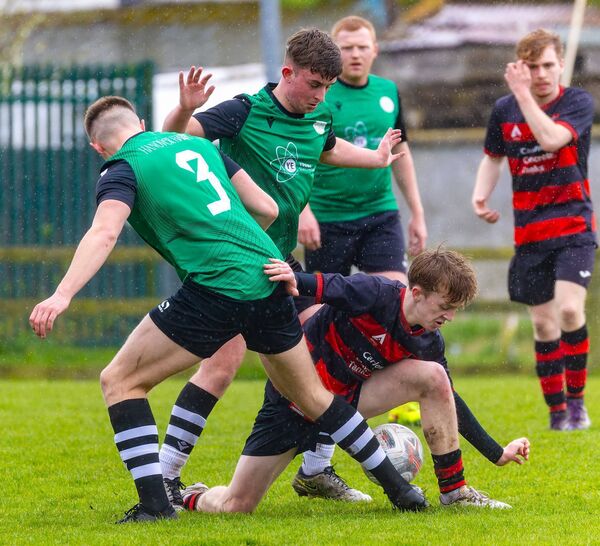 Hanover’s Cian Ray and Harry Lloyd battle with Parkville’s Niall O’Byrne. Hanover’s Cian Ray and Harry Lloyd battle with Parkville’s Niall O’Byrne.