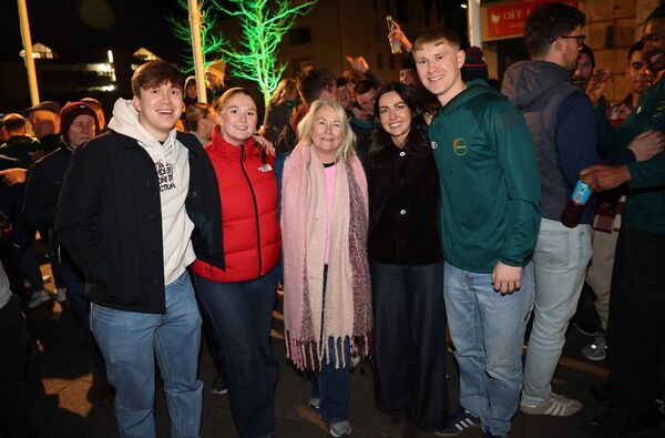 Ross Dunphy with his family at the homecoming in Haymarket Photo: Pat Ahern