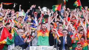 <p>Paul Doyle lifts the McDonagh Cup for Carlow back in 2023, their path to this year's final has been laid out with the fixtures for this year's competition confirmed. Photo: ©INPHO/Tom Maher</p>