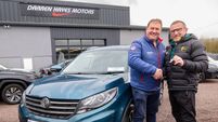 Senior football manager Joe Murphy presented with a car from Darren Hayes Motors 