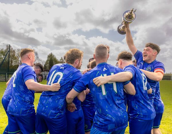 Slaney Rovers captain Eoin Curran and teammates celebrate after clinching Tully's Travel Division 1 with a convincing win over New Oak in Carlow. Photos: Michael O'Rourke Photography 2026