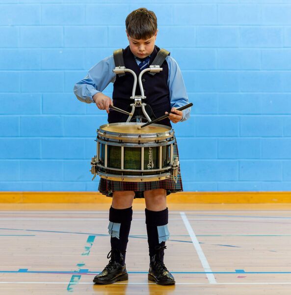 Louis Smith practices in the sports hall before the Pan Celtic drumming competition in Gaelcholáiste Cheatharlach on Saturday