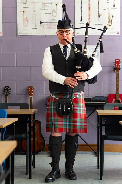 A piper at the piping and drumming competition 