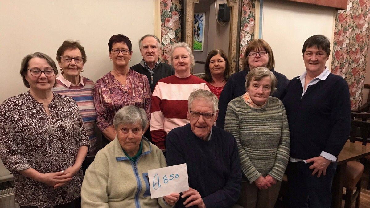 Bagenalstown festive swim committee present cheque to Carlow/Kilkenny Homecare Team 