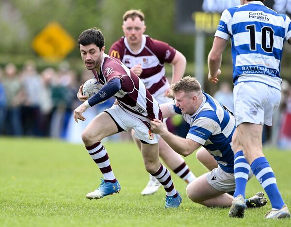 Athy's Jack Henry cannot stop Tullow's Colm Gorry.