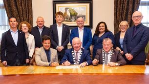 <p>Cathaoirleach Tullow MD, cllr John Penter signs a charter in Mount Wolseley Hotel twinning Tullow with Marìa de Huerva a municipality in Zaragoza in Spain. Also signing the charter is Mayor of María de Huerva Joaquín Calleja and Cathaoirleach Carlow Co Co cllr Ken Murnane. Also shown are (l-r), Rodolfo Canizares and Julia Ruiz, delegates Marìa de Huerva with cllrs Jim Deane, Ben Ward and William Paton, Nicola Timmons and Kathy Walsh from Develop Tullow and Michael Brennan, Director of Services Carlow County Council Photo: Michael O'Rourke Photography 2026</p>