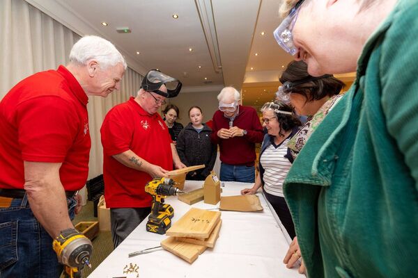 Tullow Men's Shed chairman Frank Morris gives a demonstration of making birdboxes at the Carlow Pride of Place workshop in Ballykealey House Hotel. Photos: Michael O'Rourke Photography