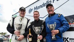 <p>Richard Kearney, centre, with Garret McKenna, left, and Tom Foley, right after winning the Airportcars.ie Formula Sheane race at Mondello Park, Kildare Photo: Barry Cregg.</p>