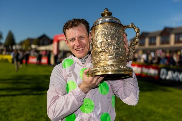 Paul Townend celebrates winning the Ladbrokes Punchestown Gold Cup with Gaelic Warrior