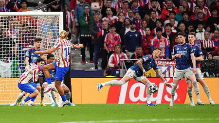 Penalty drama at both ends as Arsenal draw at Atletico Madrid