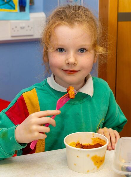 Olivia Mattimoe takes a bite of her lunch