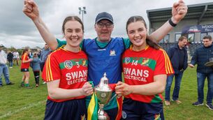 <p>Carlow captain Caoimhe Coady and double goal-scorer Abhainn Coady celebrate with their father Pat following their All-Ireland U23 'C' Camogie Championship victory over Meath in Castletown Geoghegan, Westmeath. All Photos: INPHO/James Crombie.</p>