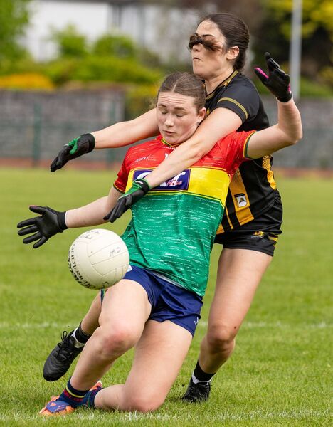 Carlow’s Kate Burke under pressure from Kilkenny’s Emer Dunphy Photo: © Michael O’Rourke Photography