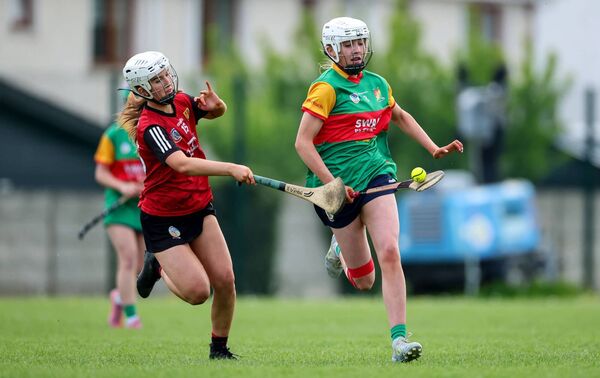 Carlow's hat-trick hero Eimear Bolger glides beyond Down's Hannah Brown.