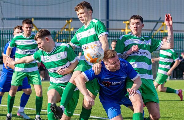 Bagenalstown’s Thomas Bolger throws his head in between New Oak’s Cian Dowling, Luke Ramsbottom and Dean Denieffe-Kelly.
