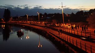 <p>Walkers along the Barrow Track on Saturday morning during the 'Darkness into Light' fundraiser Photo: Ian Hannon</p>