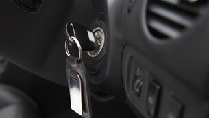 <p>Car ignition with key, close-up</p>