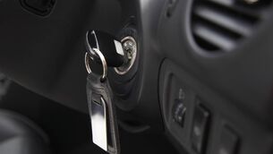 <p>Car ignition with key, close-up</p>