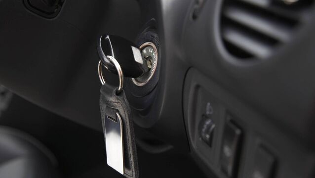 <p>Car ignition with key, close-up</p>