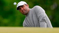 Scottie Scheffler grabs share of US PGA lead while Rory McIlroy struggles