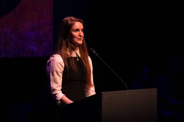 Molly Twomey reads from her poems at the literary awards
