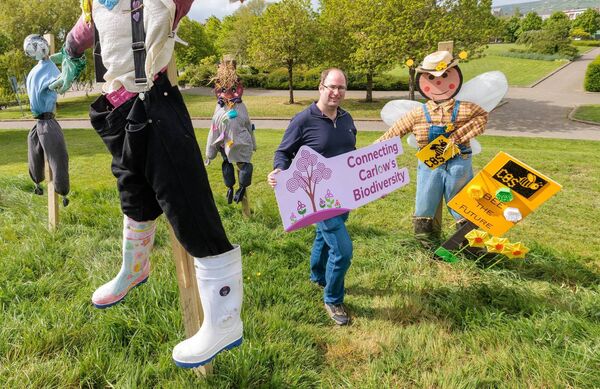 Shane Casey, Carlow County Council Biodiversity Officer, standing among the 'guardians of the grasslands’ created by local students, which will be dotted across Carlow Town this summer. Pic. Michael O’Rourke Photography
