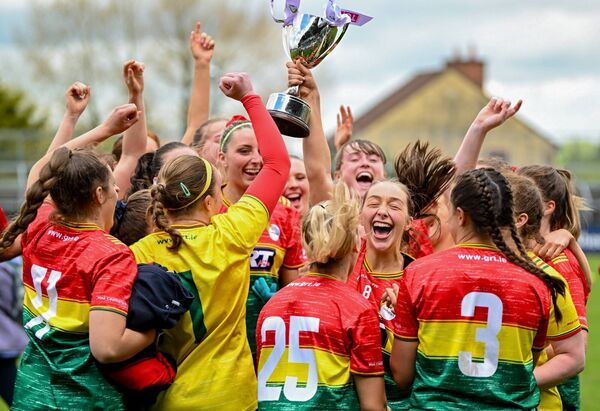 Captain Roisin Bailey leads the celebrations after her side's victory over Longford at St Conleth's Park in Newbridge, Kildare. Photo: Ramsey Cardy/Sportsfile.