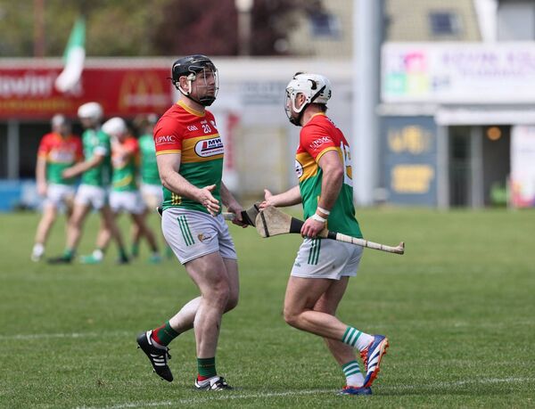 Carlow captain Chris Nolan makes way for John Michael Nolan. Carlow captain Chris Nolan makes way for John Michael Nolan.