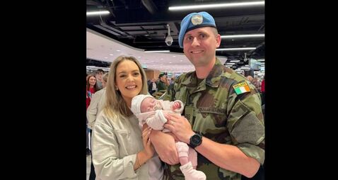 Soldier meets newborn daughter for first time at Dublin Airport 