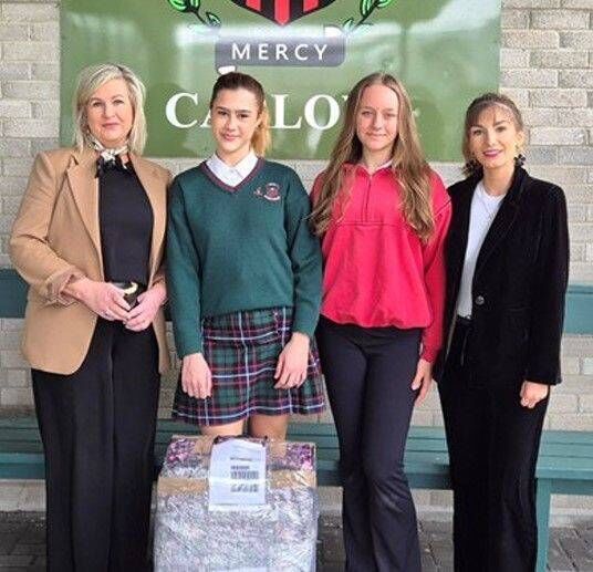 St Leo's principal Niamh Broderick with student designers Nia Pavliashvili and Daria Velychko and art teacher, Lauren Connors St Leo's principal Niamh Broderick with student designers Nia Pavliashvili and Daria Velychko and art teacher, Lauren Connors