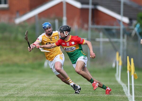 Ruairi Murphy breaks away from Antrim's Oisín Donnelly. Ruairi Murphy breaks away from Antrim's Oisín Donnelly.