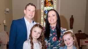 <p>Ava Lamphiere with her parents Mark and Claire and best friend Annabelle in St Mary's Church, Bennekerry Photos: Michael O'Rourke Photography</p>